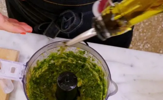 Add oil and blend to desired consistency